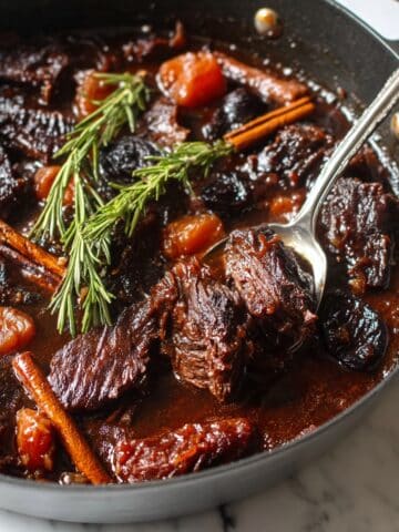 Slow-Cooked Minute Steak with Dried Fruit and Spiced Carrots Recipe
