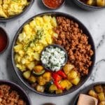 Breakfast Meal Prep Bowls with Spicy Ground Chicken, Roasted Potatoes, and Scrambled Eggs Recipe