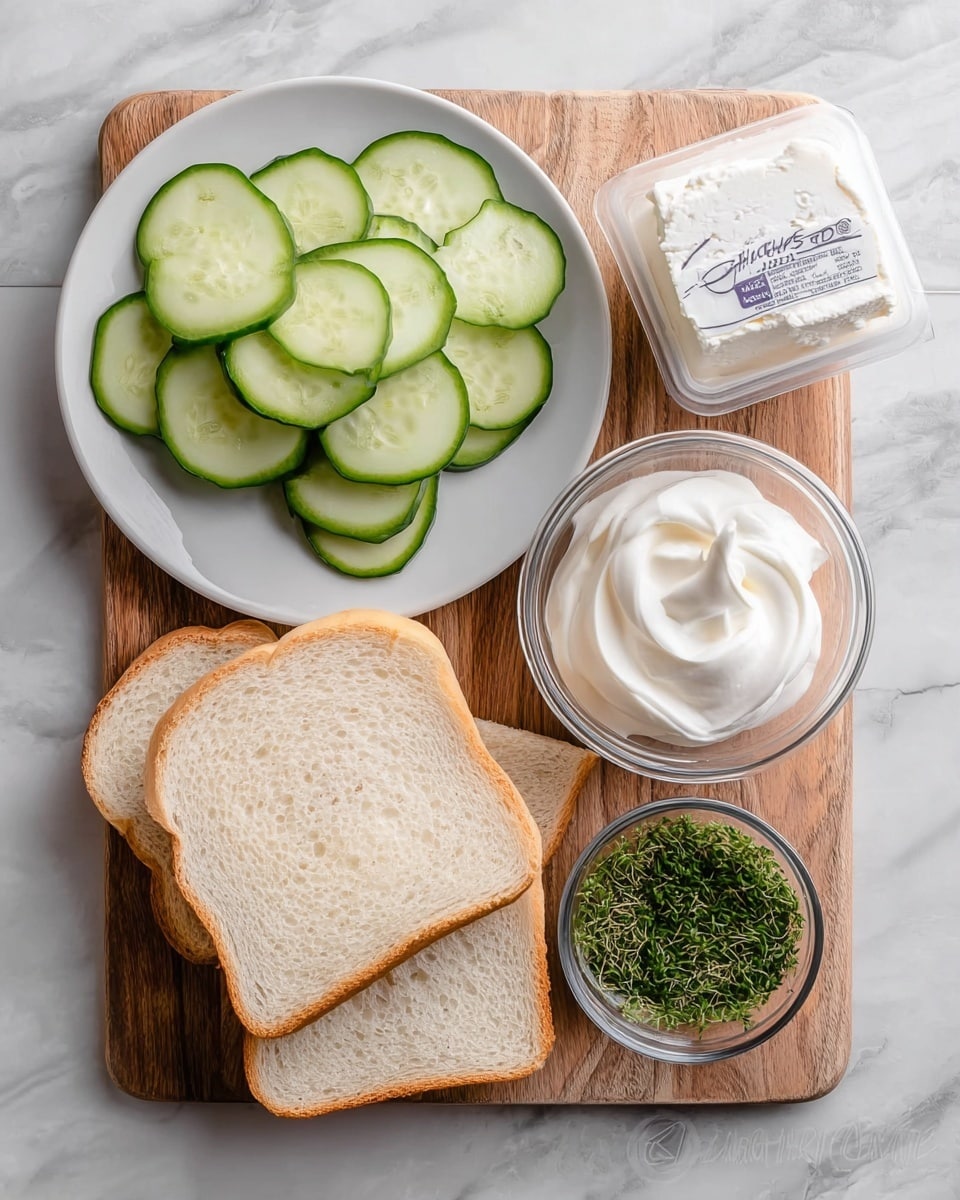 The image shows a wooden board placed on a white marbled surface with food ingredients arranged neatly. On the top left, there is a white plate filled with thin, round slices of cucumber, showing bright green skin and pale green centers with seeds. To the right of the plate is an open white container labeled soft cheese, displaying smooth, white cheese inside. Below the cheese container, there is a small clear glass bowl holding smooth, white cream. Next to this bowl, on the bottom right of the board, there is a small clear container filled with finely chopped green herbs. On the bottom left of the board, there are three slices of white bread stacked slightly unevenly. The overall scene is brightly lit, showing clear textures and fresh, clean colors photo taken with an iphone --ar 4:5 --v 7