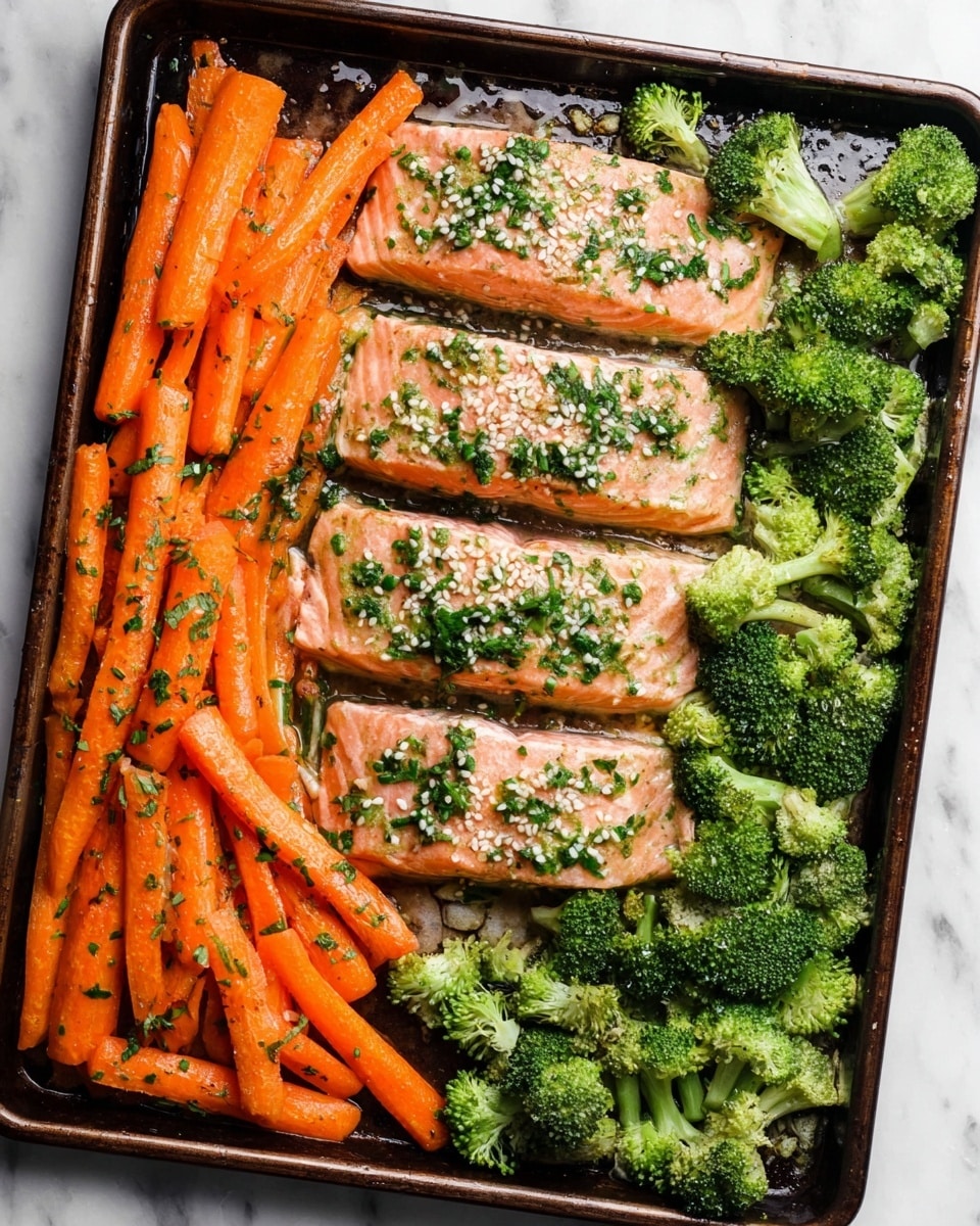 The image shows a baking tray filled with a cooked meal. On the tray, there are four thick, pink salmon fillets placed in the middle, each topped with green chopped herbs and small white sesame seeds. On the left side of the tray is a layer of bright orange carrot sticks, cut into long pieces and seasoned with herbs. On the right side, there is a layer of vibrant green broccoli florets. The tray rests on a white marbled surface. photo taken with an iphone --ar 4:5 --v 7