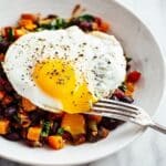 Breakfast Burrito Bowl with Sweet Potatoes, Veggies, Black Beans, and Fried Egg Recipe
