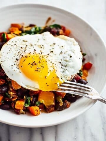 Breakfast Burrito Bowl with Sweet Potatoes, Veggies, Black Beans, and Fried Egg Recipe