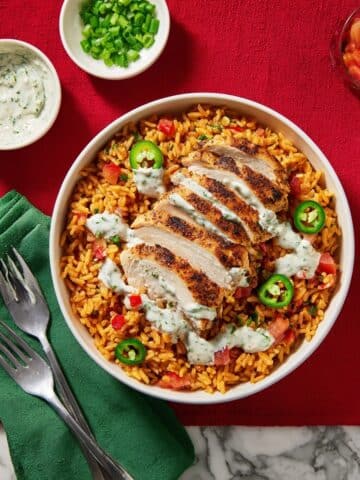Spicy Peruvian Chicken and Loaded Rice with Pickled Jalapeño & Creamy Salsa Verde Recipe