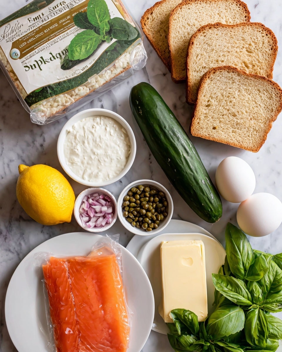 The image shows ingredients arranged on a white marbled surface, including four slices of bread stacked diagonally on the upper right, a whole long dark green cucumber placed vertically in the middle, and a package of smoked Atlantic salmon with an orange-pink color on the lower left. Two white eggs are positioned near the center, close to a bright yellow lemon. There is a small white bowl filled with creamy white sauce near the eggs, another small white bowl with green capers, and a third small white bowl containing finely chopped red onion. A bunch of fresh green herbs is spread near the right side, and a rectangular block of cream cheese sits on a white plate at the bottom right. A pat of yellow butter is on a white plate on the left side, and fresh green basil leaves are on the upper left. Photo taken with an iphone --ar 4:5 --v 7