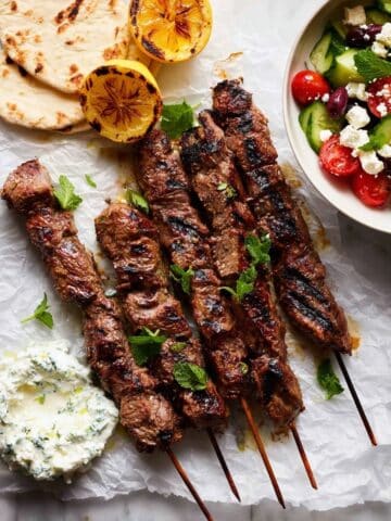 Lamb Souvlaki with Tzatziki, Pita, and Greek Salad Recipe