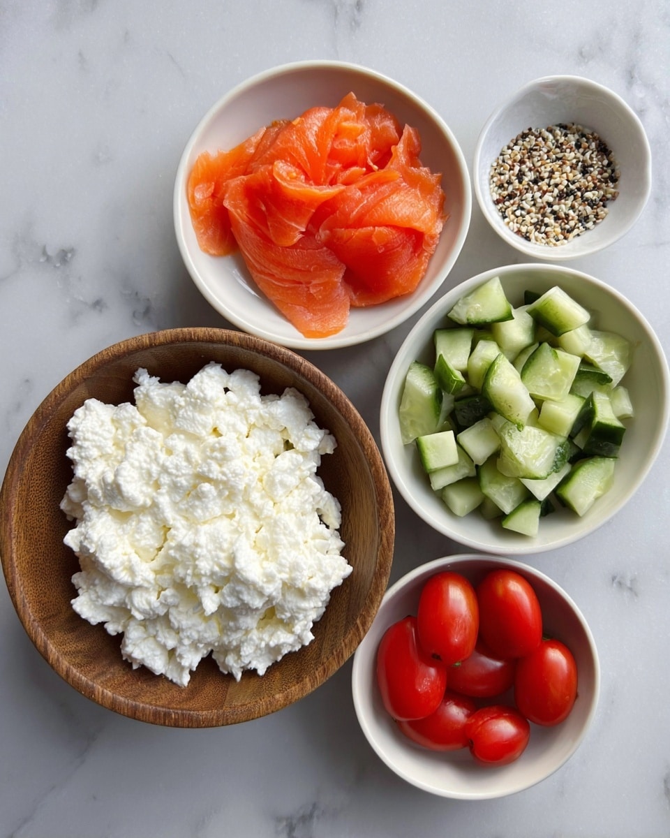 The image shows five small bowls arranged on a white marbled surface. The largest bowl, made of wood, is filled with white, lumpy cottage cheese. To the top left is a white bowl with several thin slices of bright orange smoked salmon. To the top right is another white bowl, this time angular, filled with light to dark green chopped cucumber pieces. Below that is a small white bowl holding six shiny red grape tomatoes. Lastly, a very small white bowl at the bottom center contains a mix of black, white, and light brown seasoning seeds. Photo taken with an iphone --ar 4:5 --v 7