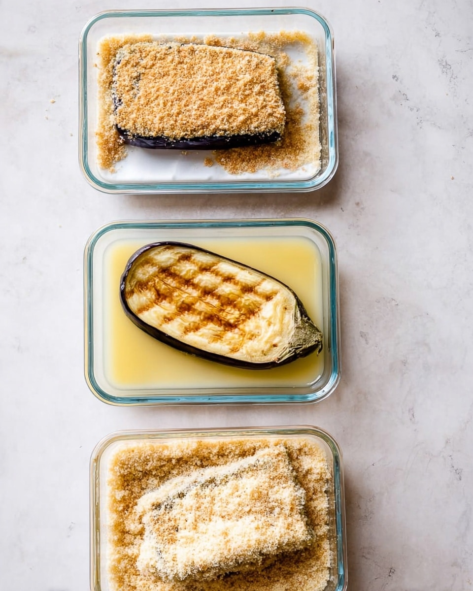The image shows three clear glass containers on a white marbled surface. The top container has a flat tray with two eggplant slices covered with a rough, light beige breadcrumb layer. The middle container holds a single grilled eggplant slice resting in a light yellow liquid, showing grill marks and a smooth texture. The bottom container has a single eggplant slice being coated with the same light beige breadcrumbs, partially covered and surrounded by the crumbs, creating a textured, grainy look. Photo taken with an iphone --ar 4:5 --v 7