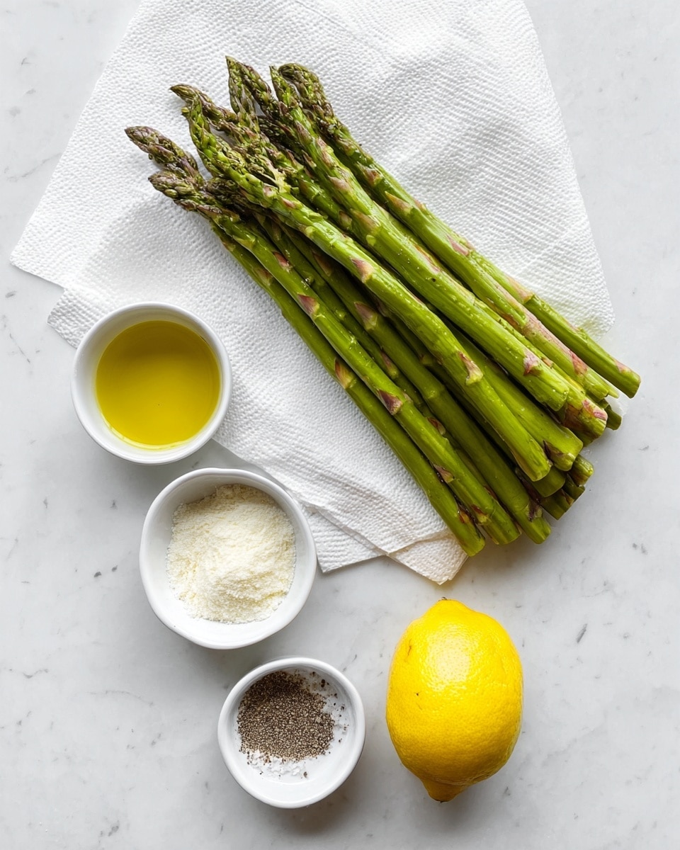 The image shows a bunch of fresh green asparagus stalks stacked in a white paper towel, placed on a white marbled surface. Below and to the left of the asparagus are four small white bowls arranged loosely in a diagonal line: the top bowl has clear golden olive oil, the middle bowl contains a fine white powder resembling grated cheese, and the bottom bowl holds black pepper. To the right of these bowls is a bright yellow lemon. The scene is clean, bright, and organized with natural light. Photo taken with an iphone --ar 4:5 --v 7