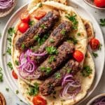 Authentic Adana Kebab with Sumac Onions and Pita Recipe