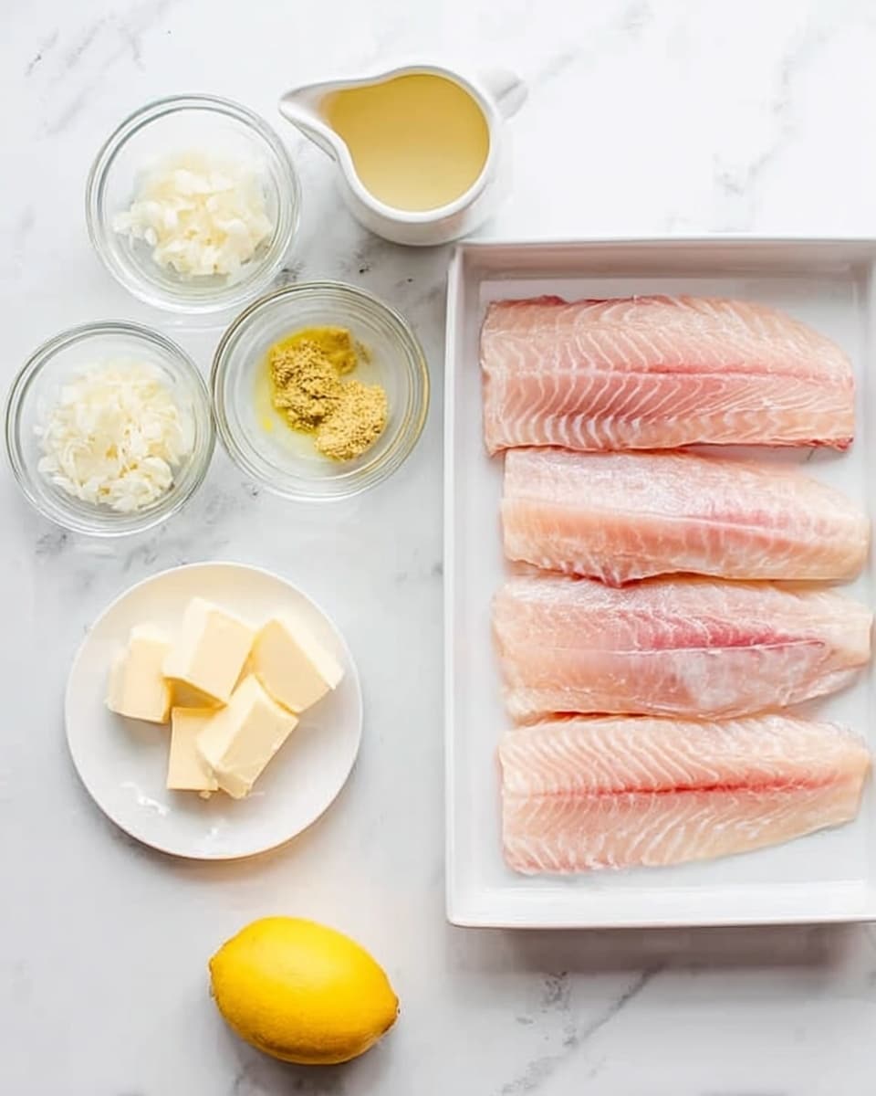 The image shows four raw pink fish fillets arranged in a row inside a white rectangular dish on the right side. On the left side, there is a white square plate holding several small clear glass bowls with different ingredients: one bowl has finely shredded white onions, another has yellow mustard, a third holds minced garlic, and a small white pitcher contains a pale yellow liquid, likely a sauce. Below the square plate, there is a whole lemon and another small white round plate with a few chunks of light yellow butter. All items are placed on a white marbled surface. Photo taken with an iphone --ar 4:5 --v 7