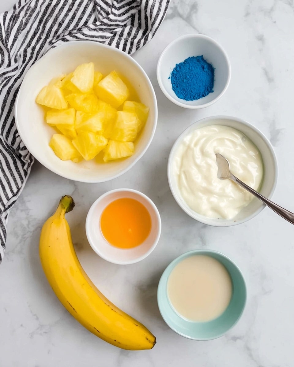 A wooden tray holds nine containers filled with ingredients on a white marbled surface. Starting from the top left, there is a blue bowl filled with white flour, next to it on the right are two bright yellow lemons placed side by side, and further right is a clear glass measuring cup filled with white milk. On the bottom row, from left to right, a pink bowl contains white sugar, next to it a pink bowl packed with dark blue fresh blueberries. In the middle is a small white dish holding white baking powder, to its right is a small white cup with amber-colored vanilla extract, and the last on the right is a white bowl with light golden oil. The photo is taken with an iphone --ar 4:5 --v 7