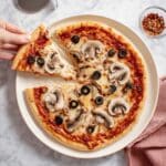 Tortilla Pizza with Olives, Mushrooms, and Red Pepper Flakes Recipe