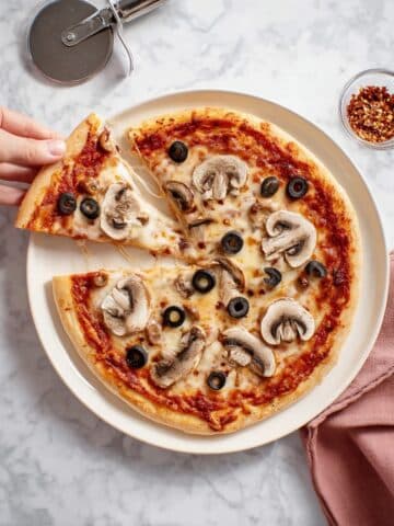 Tortilla Pizza with Olives, Mushrooms, and Red Pepper Flakes Recipe
