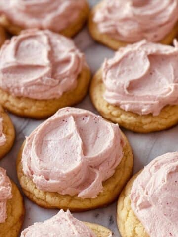 Pink Frosted Ricotta Cookies with Berry Jam and Sprinkles Recipe