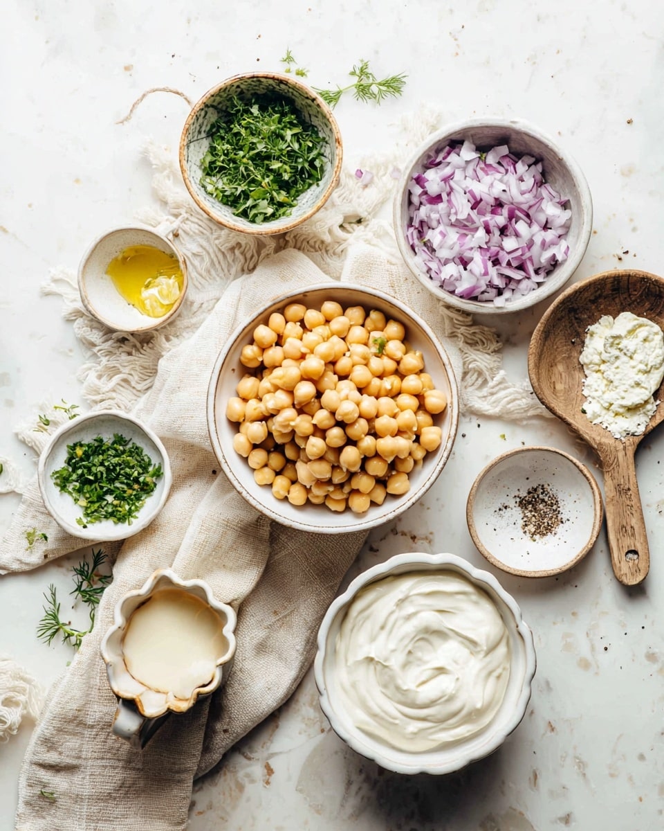 A top view of several small white bowls and containers arranged over a white marbled surface with a cream cloth. In the center is a white bowl filled with light brown chickpeas. Above it, a white cup holds chopped green herbs. To the right, a small white bowl contains finely chopped purple onions. There is a rustic wooden spoon filled with a white powder, next to a small white dish with black pepper and salt. A larger white bowl at the bottom right contains smooth white cream. On the bottom left, a small white scalloped dish holds fine green herbs, next to a cream ceramic cup with yellow mustard, and a tiny brown and white jug with a light liquid. The setting has a natural, simple, and handmade feel. Photo taken with an iphone --ar 4:5 --v 7