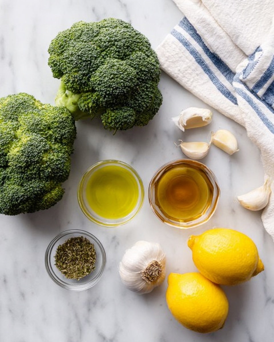 The image shows two whole green broccoli heads placed on a white marbled surface. Near them are two bright yellow whole lemons on the right side. Between the broccoli and lemons, there is a small clear glass bowl with light yellow liquid, and next to it is a smaller clear bowl with a darker golden liquid. Above, there is a small clear bowl filled with dry green dried herbs. Near the center, two whole garlic bulbs and a single garlic clove are lying, along with a white cloth with blue stripes placed in the top right corner. photo taken with an iphone --ar 4:5 --v 7
