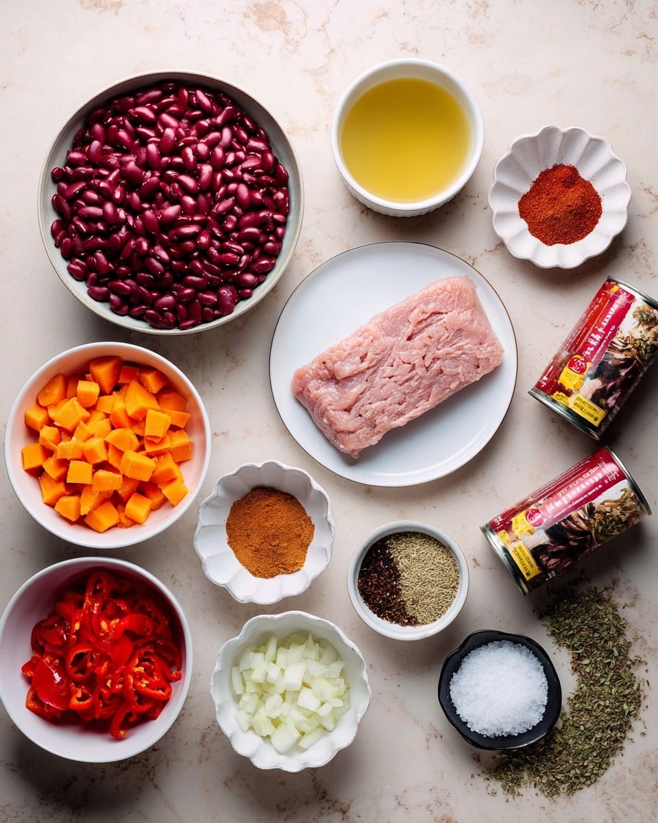 A white bowl at the top left filled with dark red kidney beans, next to the top center white bowl with a flat, light pink raw meat strip. Surrounding these are smaller white dishes: a small cup of yellowish broth at the top right, a ruffled white bowl with dark red chili powder, and three smaller white and black dishes with different spices below the broth. On the bottom left, a white bowl with chopped orange sweet potatoes next to a white bowl with small chopped red peppers. Two black and red canned tomatoes sit side by side at the front center. Chopped white onions are in a small white bowl below the broth, and small piles of salt, olive oil, and herbs rest on the white marbled surface to the right. The scene is bright and detailed with a clear view of every colored ingredient. photo taken with an iphone --ar 4:5 --v 7
