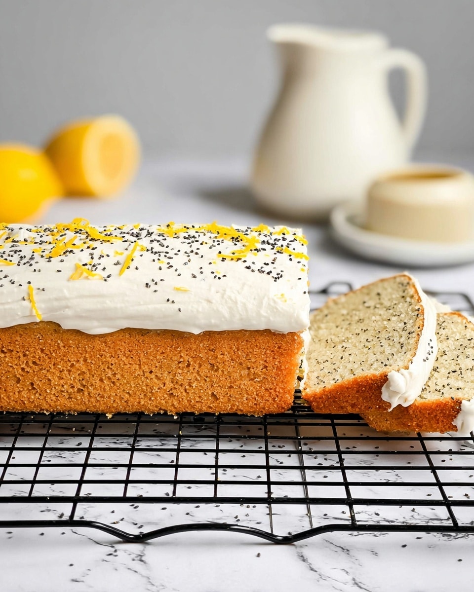 Two slices of light yellow lemon poppy seed cake with small black poppy seeds and bits of lemon inside are placed on a black wire cooling rack over a white marbled surface. The cake has a thick white frosting layer with some yellow lemon zest on top and more black poppy seeds sprinkled over it. Lemon slices are scattered around the rack, adding bright yellow and pale white colors. A part of the cake, also covered with white frosting and poppy seeds, sits at the bottom left corner of the image. Photo taken with an iphone --ar 4:5 --v 7