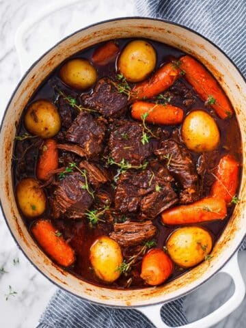 Melt-In-Your-Mouth Dutch Oven Pot Roast with Potatoes and Carrots Recipe