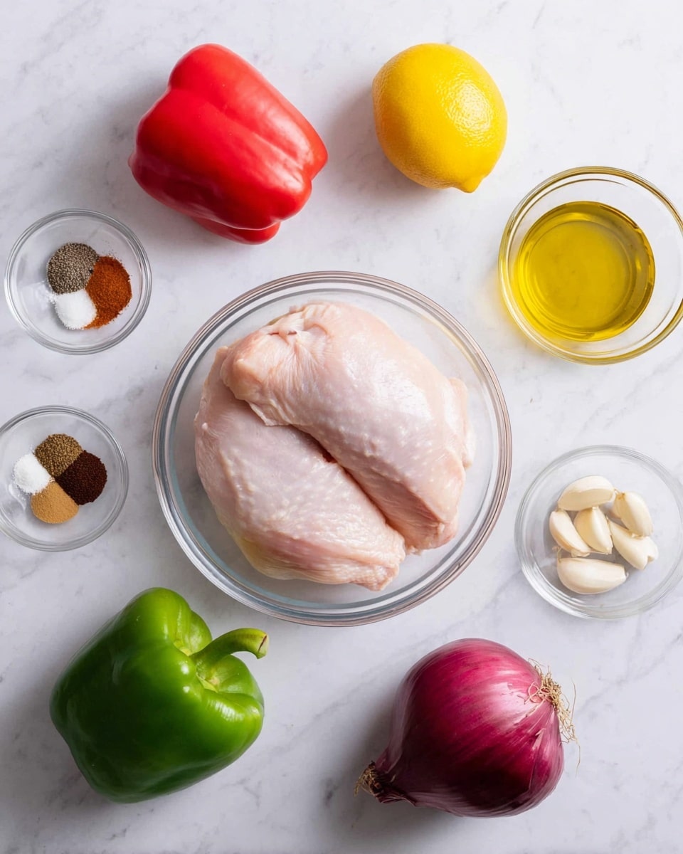 A clear glass bowl in the center holds two large raw chicken pieces, pale pink and smooth in texture. Around it, various fresh ingredients lie on a white marbled surface: a shiny red bell pepper on the left, a green bell pepper below it, and a bright yellow lemon with a smooth peel near the top. To the right, there is a whole red onion with a deep purple skin and a small clear bowl with three cloves of garlic inside. Near the top left is a small clear bowl with assorted spices including dark brown, lighter brown, white, and black powders. Next to it, a glass bottle filled with golden olive oil is positioned. The overall setting is clean and bright, with ingredients spaced out neatly. Photo taken with an iphone --ar 4:5 --v 7