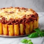 Baked Rigatoni with Savory Meat Sauce and Cheesy Bechamel Recipe