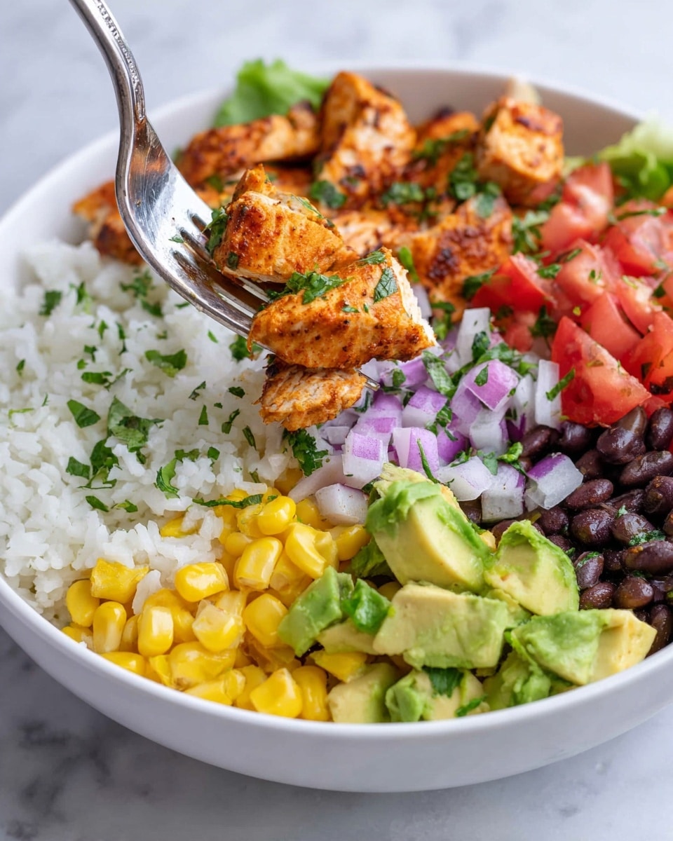 A white bowl sits on a white marbled surface, filled with layers of cooked white rice sprinkled with chopped green herbs on the bottom left, bright yellow corn kernels at the bottom right, black beans mixed with green herbs above the corn, diced red tomatoes to the right, chopped avocado pieces with green skin and light yellow flesh on the top right, finely chopped purple onions in the middle, and grilled, orange-brown seasoned chicken strips on the top left. A fork is lifting a bite with a piece of chicken, avocado, tomato, and onion. Photo taken with an iphone --ar 4:5 --v 7