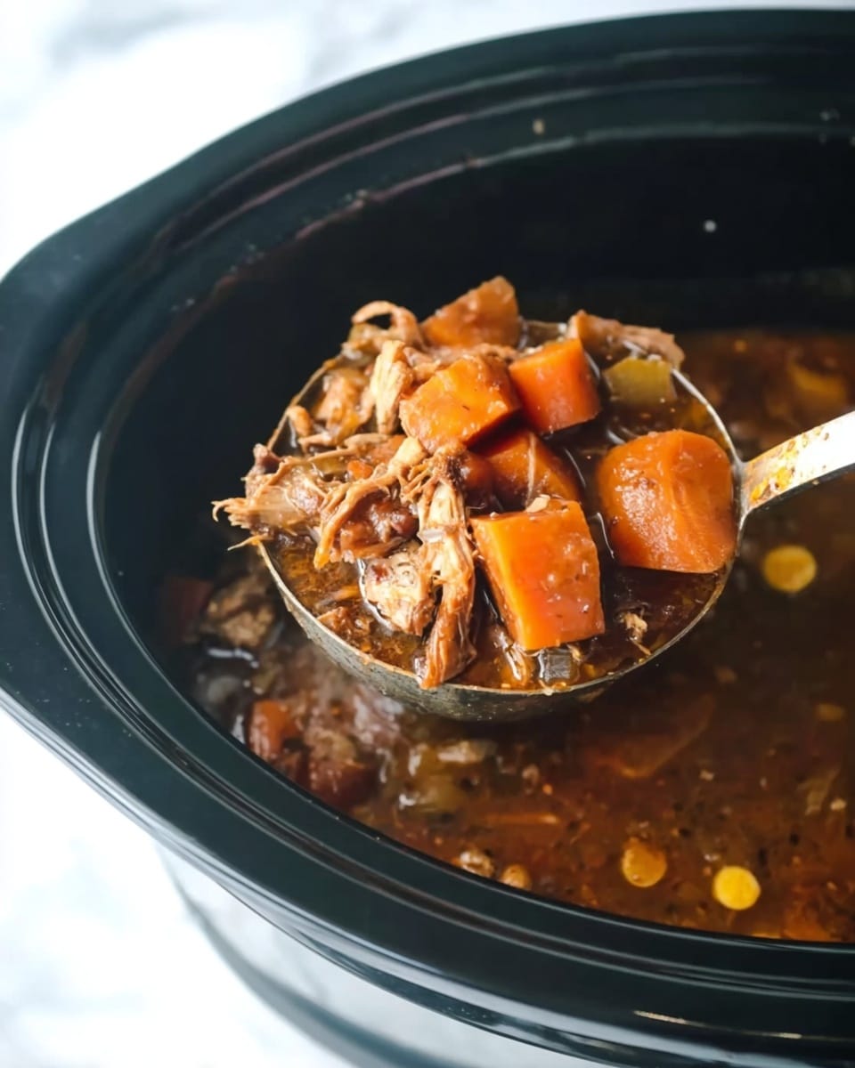 The image shows a metal ladle lifting a portion of slow-cooked stew from a black slow cooker. The stew contains light brown shredded meat and large chunks of soft orange carrots, all in a rich dark brown broth with some visible small round yellow pieces. The slow cooker sits on a white marbled surface. The focus is on the ladle with the stew, highlighting the textures of the meat and carrots in the thick broth. Photo taken with an iphone --ar 4:5 --v 7