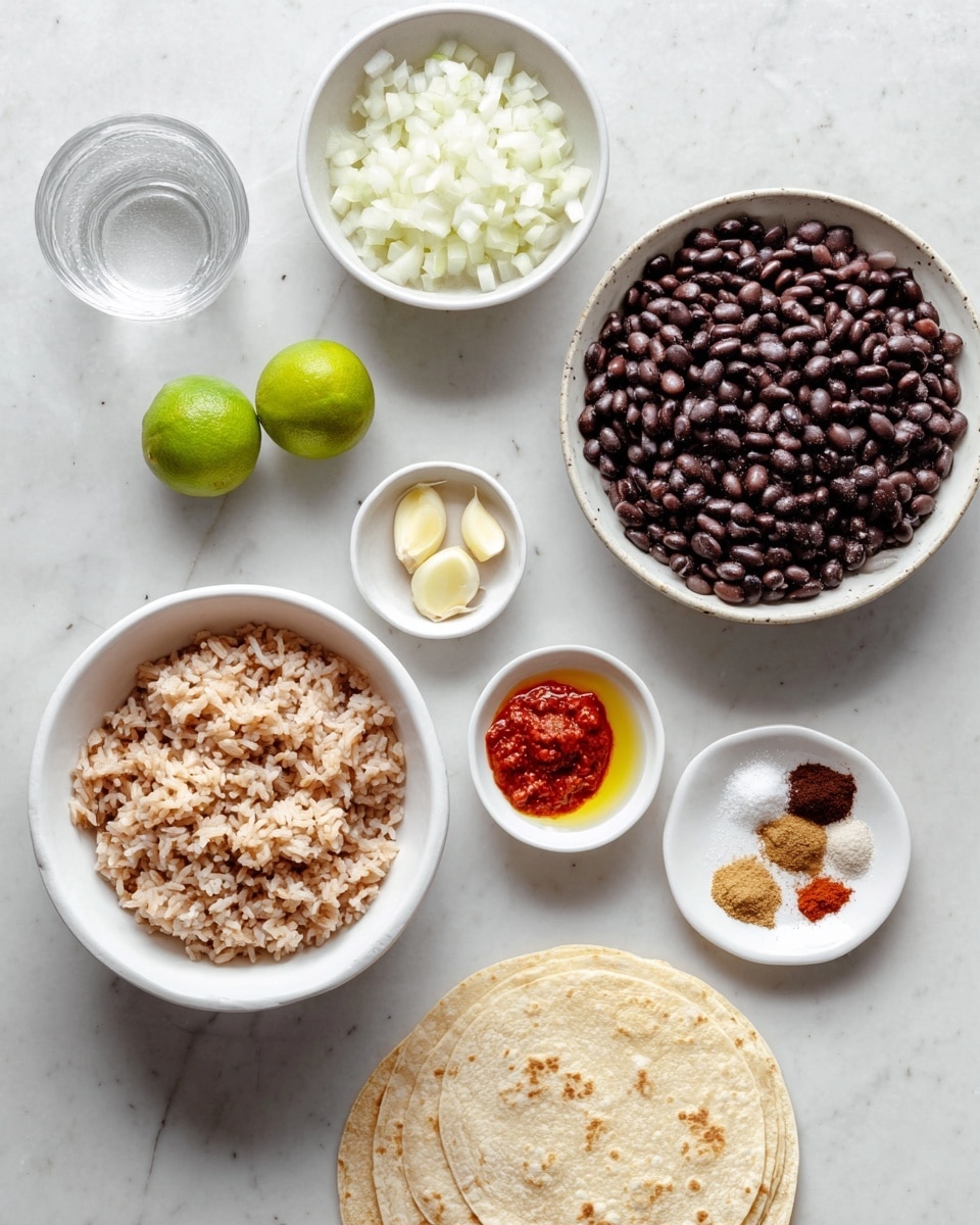 The image shows several small white bowls and plates arranged neatly on a white marbled surface. There is a large white bowl filled with cooked black beans at the top right, and below it, a bowl of chopped white onions. To the left, two whole limes sit next to a glass partially filled with water. A small white bowl contains sliced garlic, and near it is a tiny bowl with a light yellow liquid, likely oil. A small white plate holds a bright red paste, while another white plate displays three spices: a reddish powder, a brown powder, and a light tan powder. At the bottom left, a large white bowl is filled with cooked brown rice, and on the bottom right, a stack of pale corn tortillas rests directly on the white marbled surface. Photo taken with an iphone --ar 4:5 --v 7