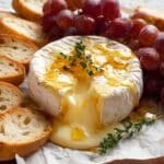 Baked Brie with Honey, Thyme, and Crostini Recipe